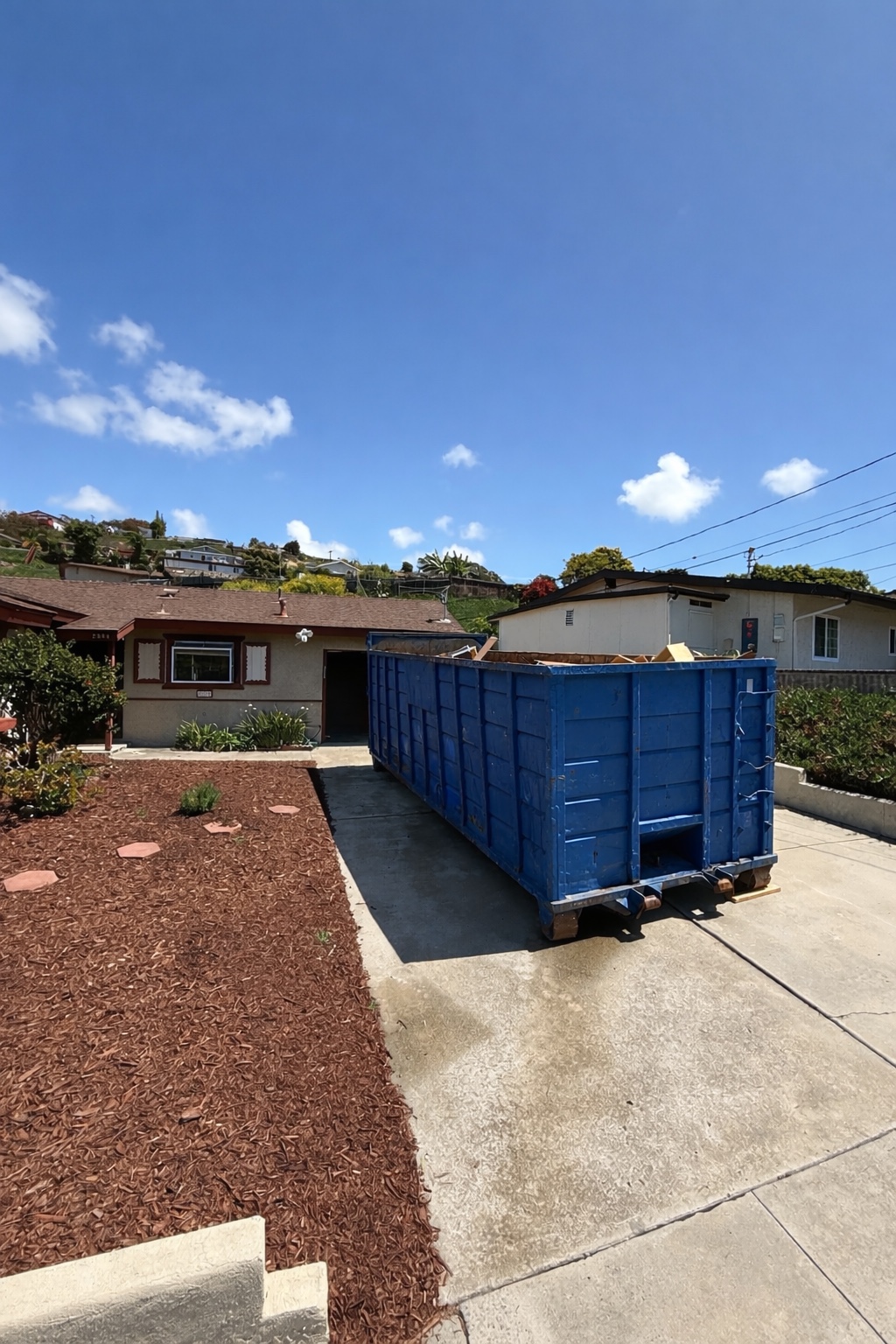 Dumpster rental at a residential property